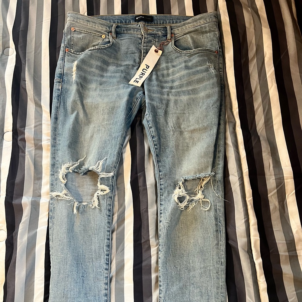 Size 36 purple jeans pre owned great condition two slits